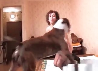Naked brunette and her horny dog